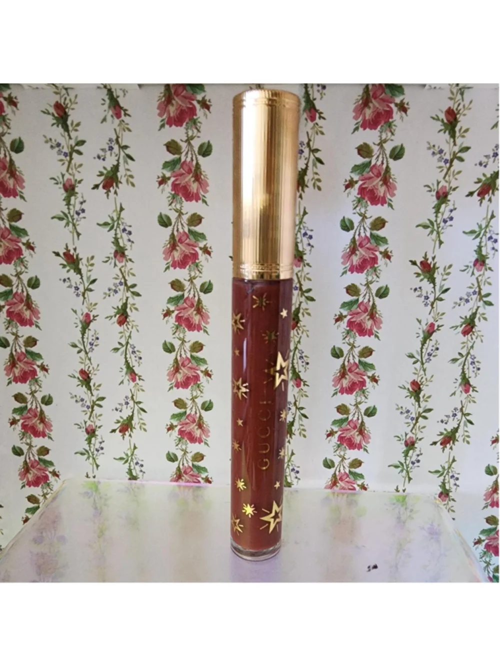 Gucci lip gloss in brown with gold stars #luxury #lipgloss